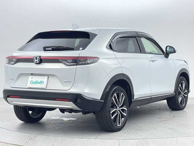 ホンダ ヴェゼル ハイブリッド e:HEV Z 新潟県 2023(令5)年 0.9万km プレミアムサンライトホワイトパール ４WD/ホンダセンシング/ワンオーナー/禁煙車/ホンダコネクトディスプレイ/　　AM/FM/BT/フルセグ/applecarplay/androidauto/マルチビューモニター/ハンズフリーアクセスパワーバックドア(予約クローズ付)/アダプティブクルーズコントロール/LEDシーケンシャルターンランプ/前席シートヒーター/純正18インチアルミホイール付/ダウンヒルアシストコントロール/電動パーキングブレーキ/オートブレーキホールド/ミラーヒーター/ステアリングスイッチ/ステアリングヒーター/USBポート/純正ドライブレコーダー/ブラインドスポットモニター/エンジンスタータ/スマートキー/ETC2.0