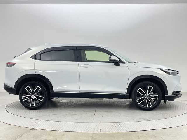 ホンダ ヴェゼル ハイブリッド e:HEV Z 新潟県 2023(令5)年 0.9万km プレミアムサンライトホワイトパール ４WD/ホンダセンシング/ワンオーナー/禁煙車/ホンダコネクトディスプレイ/　　AM/FM/BT/フルセグ/applecarplay/androidauto/マルチビューモニター/ハンズフリーアクセスパワーバックドア(予約クローズ付)/アダプティブクルーズコントロール/LEDシーケンシャルターンランプ/前席シートヒーター/純正18インチアルミホイール付/ダウンヒルアシストコントロール/電動パーキングブレーキ/オートブレーキホールド/ミラーヒーター/ステアリングスイッチ/ステアリングヒーター/USBポート/純正ドライブレコーダー/ブラインドスポットモニター/エンジンスタータ/スマートキー/ETC2.0
