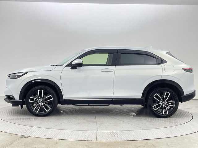 ホンダ ヴェゼル ハイブリッド e:HEV Z 新潟県 2023(令5)年 0.9万km プレミアムサンライトホワイトパール ４WD/ホンダセンシング/ワンオーナー/禁煙車/ホンダコネクトディスプレイ/　　AM/FM/BT/フルセグ/applecarplay/androidauto/マルチビューモニター/ハンズフリーアクセスパワーバックドア(予約クローズ付)/アダプティブクルーズコントロール/LEDシーケンシャルターンランプ/前席シートヒーター/純正18インチアルミホイール付/ダウンヒルアシストコントロール/電動パーキングブレーキ/オートブレーキホールド/ミラーヒーター/ステアリングスイッチ/ステアリングヒーター/USBポート/純正ドライブレコーダー/ブラインドスポットモニター/エンジンスタータ/スマートキー/ETC2.0