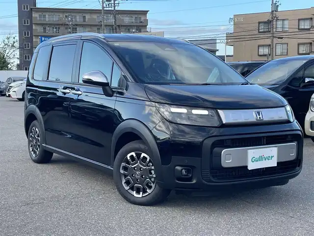 ホンダ フリード ハイブリット e:HEV クロスター 石川県 2025(令7)年 0.1千km 黒 登録済未使用車/4WD/ハイブリット/純正9型ナビ/フルセグTV/バックカメラ/LEDヘッドライト/両側パワースライドドア/ホンダセンシング/レーダークルーズ/スマートキー/プッシュスタート/保証書