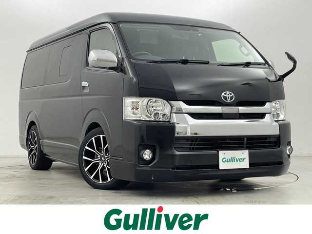 トヨタ ハイエース GL 群馬県 2018(平30)年 6.4万km ブラックマイカ 片側パワースライドドア/LEDヘッドライト/社外カロッツェリアHDDナビ（AVIC-RW801)/・CD/DVD/MSVUSB/Bluetooth/フルセグTV/社外カロッツェリア　フリップダウンモニター/バックカメラ/社外マフラーカッター/＝＝＝＝＝/片側パワースライドドア　フリップダウンモニター　ＨＤＤナビ　バックカメラ　ＬＥＤヘッドライト　スマートキー　ＥＴＣ　プリクラッシュセーフティ　レーンディパーチャーアラート　１８インチＡＷ　ローダウン