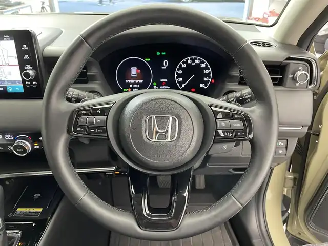 ホンダ ヴェゼル ハイブリッド e:HEV Z 滋賀県 2024(令6)年 1.5万km サンドカーキパール 純正9インチナビ/・Bluetooth/USB/フルセグ/バックカメラ/ハーフレザーシート/シートヒーター/追従クルーズコントロール/パドルシフト/パワーバックドア/ステアリングヒーター/LEDヘッドライト/レーンキープアシスト/クリアランスソナー/スマートキー