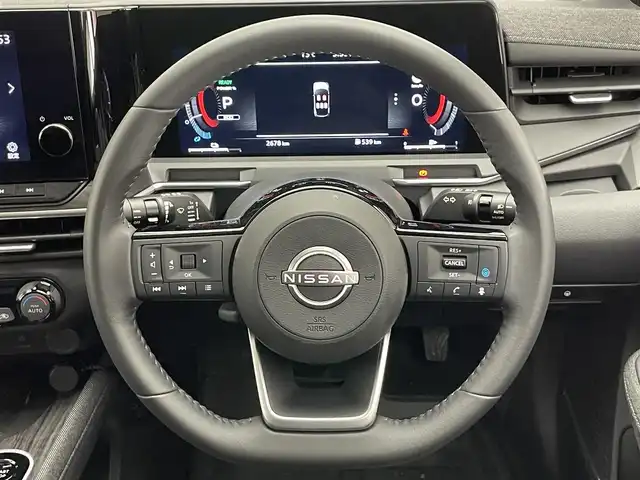 日産 オーラ G 愛知県 2024(令6)年 0.3万km グレー 純正９型ナビ　ＢＯＳＥ　プロパイロット　全方位カメラ　デジタルインナーミラー　ＨＤＭＩ　ワイヤレス充電　ＥＴＣ２．０　衝突軽減　追従クルコン　ＢＳＭ　黒ハーフレザー　フルセグ　パワーシート　純正ＡＷ