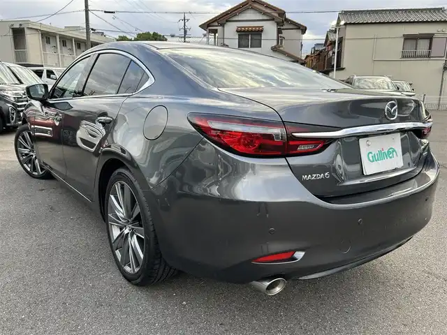 マツダ マツダ６セダン 25S Lパッケージ 愛知県 2019(令1)年 5.6万km マシーングレープレミアムM スマートキー/プッシュスタート/純正ナビ/フルセグTV/BT/USB /BOSEサウンドシステム/アラウンドビューモニター/ETC/純正19インチAW/レーンキープアシスト/スマートブレーキサポート/ブラインドスポットモニター/レーダークルーズコントロール/レザーシート/前席パワーシート（D席メモリー付き）/前席シートヒーター/エアシート/ハンドルヒーター/前後ドライブレコーダー/電動リアサンシェード/オートライト/純正フロアマット/LEDヘッドライト/取説、保証書