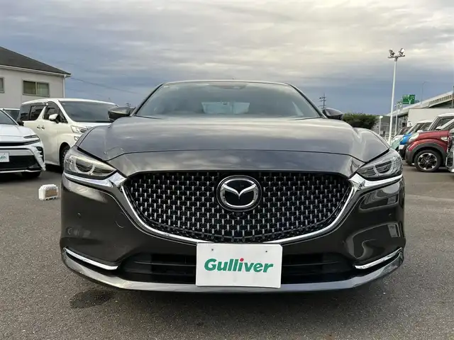 マツダ マツダ６セダン 25S Lパッケージ 愛知県 2019(令1)年 5.6万km マシーングレープレミアムM スマートキー/プッシュスタート/純正ナビ/フルセグTV/BT/USB /BOSEサウンドシステム/アラウンドビューモニター/ETC/純正19インチAW/レーンキープアシスト/スマートブレーキサポート/ブラインドスポットモニター/レーダークルーズコントロール/レザーシート/前席パワーシート（D席メモリー付き）/前席シートヒーター/エアシート/ハンドルヒーター/前後ドライブレコーダー/電動リアサンシェード/オートライト/純正フロアマット/LEDヘッドライト/取説、保証書