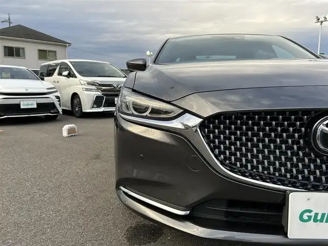 マツダ マツダ６セダン 25S Lパッケージ 愛知県 2019(令1)年 5.6万km マシーングレープレミアムM スマートキー/プッシュスタート/純正ナビ/フルセグTV/BT/USB /BOSEサウンドシステム/アラウンドビューモニター/ETC/純正19インチAW/レーンキープアシスト/スマートブレーキサポート/ブラインドスポットモニター/レーダークルーズコントロール/レザーシート/前席パワーシート（D席メモリー付き）/前席シートヒーター/エアシート/ハンドルヒーター/前後ドライブレコーダー/電動リアサンシェード/オートライト/純正フロアマット/LEDヘッドライト/取説、保証書
