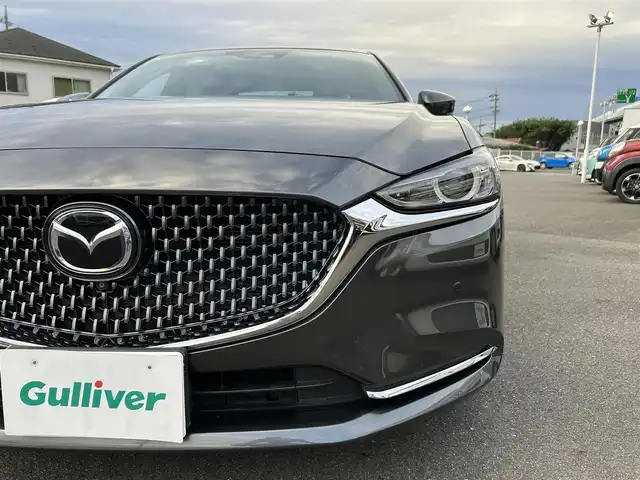 マツダ マツダ６セダン 25S Lパッケージ 愛知県 2019(令1)年 5.6万km マシーングレープレミアムM スマートキー/プッシュスタート/純正ナビ/フルセグTV/BT/USB /BOSEサウンドシステム/アラウンドビューモニター/ETC/純正19インチAW/レーンキープアシスト/スマートブレーキサポート/ブラインドスポットモニター/レーダークルーズコントロール/レザーシート/前席パワーシート（D席メモリー付き）/前席シートヒーター/エアシート/ハンドルヒーター/前後ドライブレコーダー/電動リアサンシェード/オートライト/純正フロアマット/LEDヘッドライト/取説、保証書