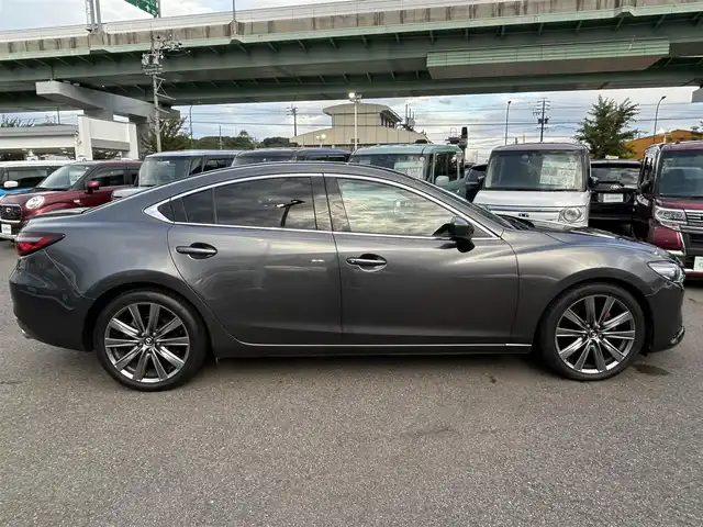 マツダ マツダ６セダン 25S Lパッケージ 愛知県 2019(令1)年 5.6万km マシーングレープレミアムM スマートキー/プッシュスタート/純正ナビ/フルセグTV/BT/USB /BOSEサウンドシステム/アラウンドビューモニター/ETC/純正19インチAW/レーンキープアシスト/スマートブレーキサポート/ブラインドスポットモニター/レーダークルーズコントロール/レザーシート/前席パワーシート（D席メモリー付き）/前席シートヒーター/エアシート/ハンドルヒーター/前後ドライブレコーダー/電動リアサンシェード/オートライト/純正フロアマット/LEDヘッドライト/取説、保証書