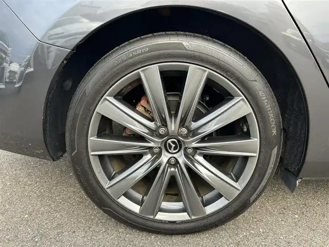マツダ マツダ６セダン 25S Lパッケージ 愛知県 2019(令1)年 5.6万km マシーングレープレミアムM スマートキー/プッシュスタート/純正ナビ/フルセグTV/BT/USB /BOSEサウンドシステム/アラウンドビューモニター/ETC/純正19インチAW/レーンキープアシスト/スマートブレーキサポート/ブラインドスポットモニター/レーダークルーズコントロール/レザーシート/前席パワーシート（D席メモリー付き）/前席シートヒーター/エアシート/ハンドルヒーター/前後ドライブレコーダー/電動リアサンシェード/オートライト/純正フロアマット/LEDヘッドライト/取説、保証書