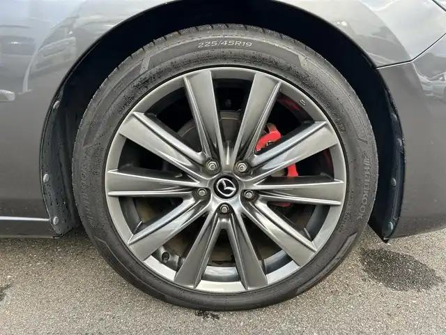 マツダ マツダ６セダン 25S Lパッケージ 愛知県 2019(令1)年 5.6万km マシーングレープレミアムM スマートキー/プッシュスタート/純正ナビ/フルセグTV/BT/USB /BOSEサウンドシステム/アラウンドビューモニター/ETC/純正19インチAW/レーンキープアシスト/スマートブレーキサポート/ブラインドスポットモニター/レーダークルーズコントロール/レザーシート/前席パワーシート（D席メモリー付き）/前席シートヒーター/エアシート/ハンドルヒーター/前後ドライブレコーダー/電動リアサンシェード/オートライト/純正フロアマット/LEDヘッドライト/取説、保証書