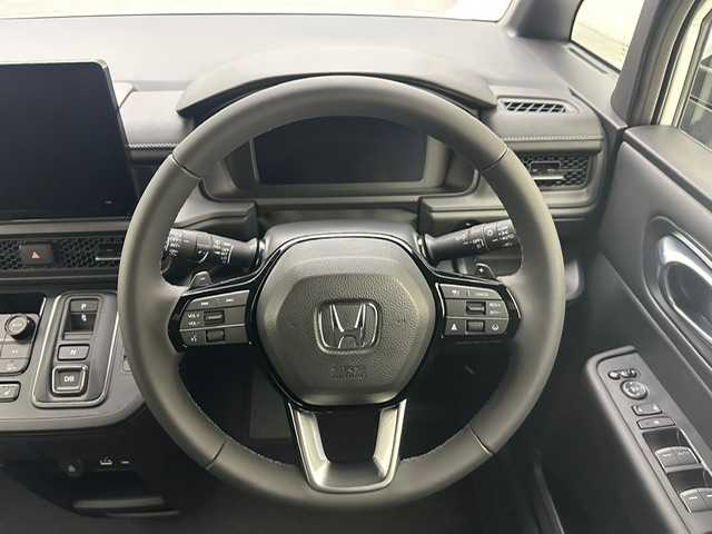 ホンダ ステップワゴン スパーダ eHEV 兵庫県 2025(令7)年 0.1千km プラチナホワイトパール 登録済未使用車/純正１１．４インチメモリナビ　（LXM-247VFLI）/（FM/AM、CD、DVD、BT、フルセグ）/純正１５．６インチ後席モニター/両側パワースライドドア/バックカメラ/レーダークルーズコントロール/パドルシフト/ホンダセンシング/ホンダコネクト/プッシュスタート/電動格納ミラー/ウィンカーミラー/ハーフレザーシート/シートヒーター（D/N席）/パワーバックドア/BSM/オットマン/LEDヘッドライト/LEDフォグランプ/オートライト/純正１６インチAW/本革巻ステアリングホイール/スマートキー×２