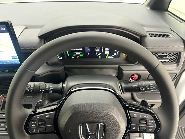 ホンダ ステップワゴン スパーダ eHEV 兵庫県 2025(令7)年 0.1千km プラチナホワイトパール 登録済未使用車/純正１１．４インチメモリナビ　（LXM-247VFLI）/（FM/AM、CD、DVD、BT、フルセグ）/純正１５．６インチ後席モニター/両側パワースライドドア/バックカメラ/レーダークルーズコントロール/パドルシフト/ホンダセンシング/ホンダコネクト/プッシュスタート/電動格納ミラー/ウィンカーミラー/ハーフレザーシート/シートヒーター（D/N席）/パワーバックドア/BSM/オットマン/LEDヘッドライト/LEDフォグランプ/オートライト/純正１６インチAW/本革巻ステアリングホイール/スマートキー×２