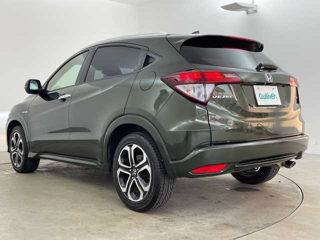 ホンダ ヴェゼル ハイブリッド Z 兵庫県 2015(平27)年 7.8万km ミスティックグリーンパール ・シティブレーキアクティブシステム/・カロッツェリア製7インチナビ＆フルセグ＆BT＆DVD/・バックカメラ/・クルーズコントロール/・電子パーキング/・オートホールド/・LEDヘッドライト/・オートライト/・スマートキー/・プッシュスタート/・横滑り防止装置/・ハーフレザーシート/・前席シートヒーター/・ルーフレール/・ETC/・社外フロアマット/・電動格納ミラー/・アイドリングストップ/・純正17インチアルミホイール