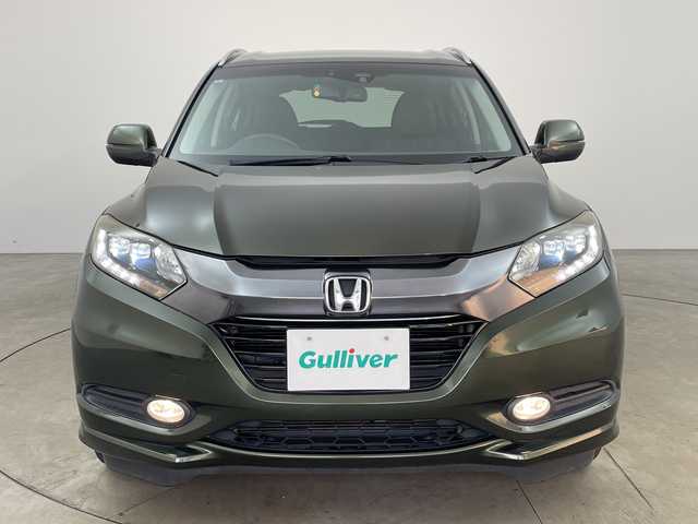 ホンダ ヴェゼル ハイブリッド Z 兵庫県 2015(平27)年 7.8万km ミスティックグリーンパール ・シティブレーキアクティブシステム/・カロッツェリア製7インチナビ＆フルセグ＆BT＆DVD/・バックカメラ/・クルーズコントロール/・電子パーキング/・オートホールド/・LEDヘッドライト/・オートライト/・スマートキー/・プッシュスタート/・横滑り防止装置/・ハーフレザーシート/・前席シートヒーター/・ルーフレール/・ETC/・社外フロアマット/・電動格納ミラー/・アイドリングストップ/・純正17インチアルミホイール