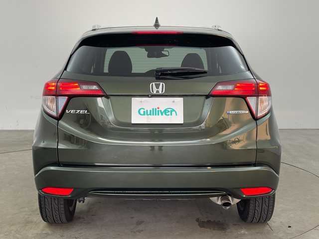 ホンダ ヴェゼル ハイブリッド Z 兵庫県 2015(平27)年 7.8万km ミスティックグリーンパール ・シティブレーキアクティブシステム/・カロッツェリア製7インチナビ＆フルセグ＆BT＆DVD/・バックカメラ/・クルーズコントロール/・電子パーキング/・オートホールド/・LEDヘッドライト/・オートライト/・スマートキー/・プッシュスタート/・横滑り防止装置/・ハーフレザーシート/・前席シートヒーター/・ルーフレール/・ETC/・社外フロアマット/・電動格納ミラー/・アイドリングストップ/・純正17インチアルミホイール