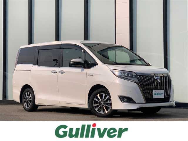 トヨタ エスクァイア ハイブリッド Gi プレミアムパッケージ 大阪府 2020(令2)年 2.9万km ホワイトパールクリスタルシャイン ワンオーナー/純正ナビ　/バックモニター/純正フリップダウンモニター　/ハーフレザーシート　/フルセグＴＶ　/両側パワースライドドア　/ビルトインＥＴＣ　/ハンドルヒーター　/ＵＳＢ充電ポート（前席2、後席2）　/ＨＤＭＩ接続/フォグランプ/LEDヘッドライト/後席バイザー/純正15インチアルミホイール/前後ドライブレコーダー
