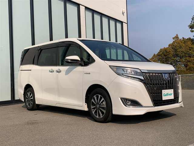 トヨタ エスクァイア ハイブリッド Gi プレミアムパッケージ 大阪府 2020(令2)年 2.9万km ホワイトパールクリスタルシャイン ワンオーナー/純正ナビ　/バックモニター/純正フリップダウンモニター　/ハーフレザーシート　/フルセグＴＶ　/両側パワースライドドア　/ビルトインＥＴＣ　/ハンドルヒーター　/ＵＳＢ充電ポート（前席2、後席2）　/ＨＤＭＩ接続/フォグランプ/LEDヘッドライト/後席バイザー/純正15インチアルミホイール/前後ドライブレコーダー