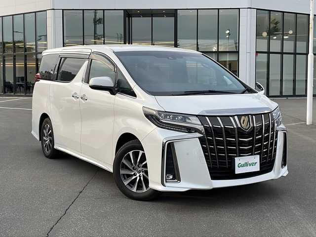 トヨタ アルファード S タイプゴールドⅡ 青森県 2022(令4)年 2.1万km ホワイトパールクリスタルシャイン ・４ＷＤ/・純正ディスプレイオーディオ/　AM/FM/CD/DVD/BT/Miracast/・フルセグＴＶ/・社外ＴＶキット/・純正フリップダウンモニター/・社外ドライブレコーダー前後タイプ/・純正ビルトインＥＴＣ/・純正デジタルルームミラー/・純正バックカメラ/・純正エンジンスターター/・両側パワースライドドア/・電動リアゲート/・レーダークルーズコントロール/・アイドリングストップ/・ＥＣＯモード/・横滑り防止機能/・オットマン/・社外フロアマット/・ドアバイザー/・スペアキー/・取扱説明書/・両側パワースライドドア/・電動リアゲート/・レーダークルーズコントロール/・アイドリングストップ/・ＥＣＯモード/・横滑り防止機能/・オットマン/・社外フロアマット/・ドアバイザー/・スペアキー/・取扱説明書/・スタッドレス２２５/６５Ｒ１７社外ＡＷ別積み