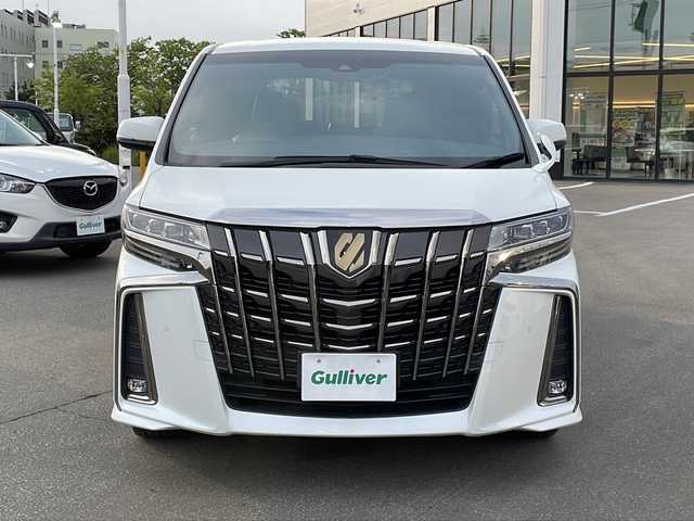 トヨタ アルファード S タイプゴールドⅡ 青森県 2022(令4)年 2.1万km ホワイトパールクリスタルシャイン ・４ＷＤ/・純正ディスプレイオーディオ/　AM/FM/CD/DVD/BT/Miracast/・フルセグＴＶ/・社外ＴＶキット/・純正フリップダウンモニター/・社外ドライブレコーダー前後タイプ/・純正ビルトインＥＴＣ/・純正デジタルルームミラー/・純正バックカメラ/・純正エンジンスターター/・両側パワースライドドア/・電動リアゲート/・レーダークルーズコントロール/・アイドリングストップ/・ＥＣＯモード/・横滑り防止機能/・オットマン/・社外フロアマット/・ドアバイザー/・スペアキー/・取扱説明書/・両側パワースライドドア/・電動リアゲート/・レーダークルーズコントロール/・アイドリングストップ/・ＥＣＯモード/・横滑り防止機能/・オットマン/・社外フロアマット/・ドアバイザー/・スペアキー/・取扱説明書/・スタッドレス２２５/６５Ｒ１７社外ＡＷ別積み