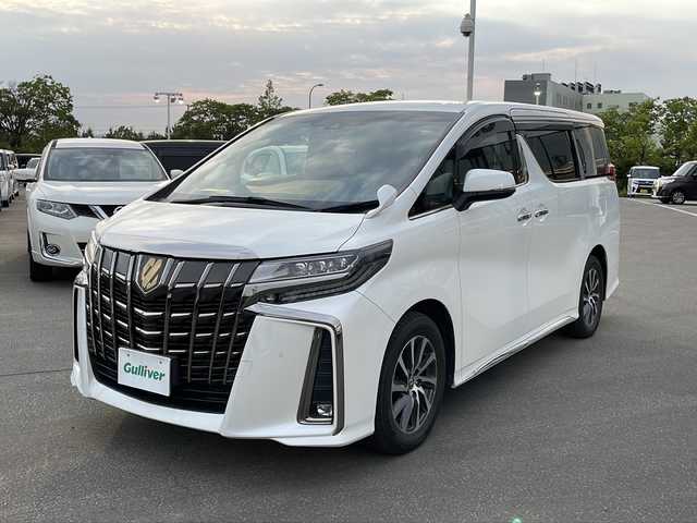 トヨタ アルファード S タイプゴールドⅡ 青森県 2022(令4)年 2.1万km ホワイトパールクリスタルシャイン ・４ＷＤ/・純正ディスプレイオーディオ/　AM/FM/CD/DVD/BT/Miracast/・フルセグＴＶ/・社外ＴＶキット/・純正フリップダウンモニター/・社外ドライブレコーダー前後タイプ/・純正ビルトインＥＴＣ/・純正デジタルルームミラー/・純正バックカメラ/・純正エンジンスターター/・両側パワースライドドア/・電動リアゲート/・レーダークルーズコントロール/・アイドリングストップ/・ＥＣＯモード/・横滑り防止機能/・オットマン/・社外フロアマット/・ドアバイザー/・スペアキー/・取扱説明書/・両側パワースライドドア/・電動リアゲート/・レーダークルーズコントロール/・アイドリングストップ/・ＥＣＯモード/・横滑り防止機能/・オットマン/・社外フロアマット/・ドアバイザー/・スペアキー/・取扱説明書/・スタッドレス２２５/６５Ｒ１７社外ＡＷ別積み