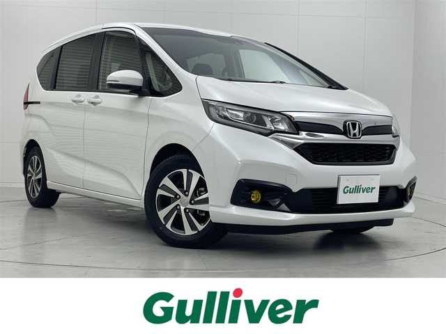 ホンダ フリード G ホンダセンシング 茨城県 2022(令4)年 3.6万km プラチナホワイトパール 純正9型ナビ［VXM-227VFNi］/フルセグ再生可/バックカメラ/Sパッケージ/Cパッケージ/寒冷地仕様/Honda SENSING/・衝突軽減ブレーキ/・誤発進抑制機能/・車線維持支援システム/・アダプティブクルーズコントロール/・路外逸脱抑制機能/・標識認識機能/・先行車発進お知らせ機能/コーナーセンサー（後のみ）/純正アルミホイール/純正フロアマット/ハーフレザーシート/シートヒーター/ビルトインETC