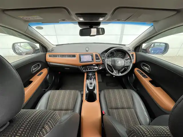 ホンダ ヴェゼル ハイブリッド Z ホンダセンシング 千葉県 2016(平28)年 4.8万km モルフォブルーP ホンダセンシング/・衝突軽減ブレーキ/レーンキープアシスト/・レーダークルーズコントロール/オートハイビーム/・クリアランスソナー/純正メモリナビ(VXM-164VFi)/・フルセグ/BT/DVD/CD/USB/バックカメラ/ステアリングスイッチ/ETC/ハーフレザーシート/シートヒーター(D/N席)/LEDヘッドライト/オートライト/フォグライト/スマートキー/プッシュスタート/ルーフレール/17インチAW/純正フロアマット