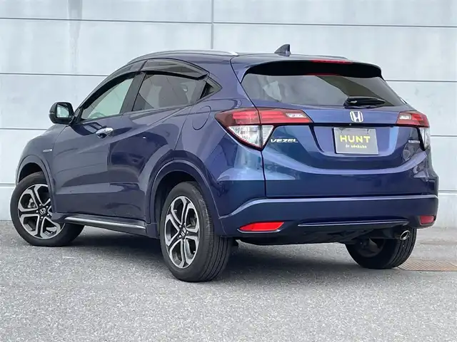 ホンダ ヴェゼル ハイブリッド Z ホンダセンシング 千葉県 2016(平28)年 4.8万km モルフォブルーP ホンダセンシング/・衝突軽減ブレーキ/レーンキープアシスト/・レーダークルーズコントロール/オートハイビーム/・クリアランスソナー/純正メモリナビ(VXM-164VFi)/・フルセグ/BT/DVD/CD/USB/バックカメラ/ステアリングスイッチ/ETC/ハーフレザーシート/シートヒーター(D/N席)/LEDヘッドライト/オートライト/フォグライト/スマートキー/プッシュスタート/ルーフレール/17インチAW/純正フロアマット