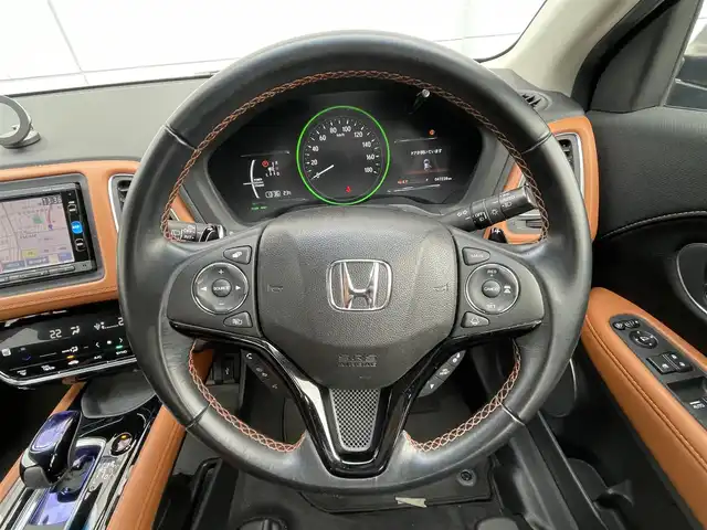 ホンダ ヴェゼル ハイブリッド Z ホンダセンシング 千葉県 2016(平28)年 4.8万km モルフォブルーP ホンダセンシング/・衝突軽減ブレーキ/レーンキープアシスト/・レーダークルーズコントロール/オートハイビーム/・クリアランスソナー/純正メモリナビ(VXM-164VFi)/・フルセグ/BT/DVD/CD/USB/バックカメラ/ステアリングスイッチ/ETC/ハーフレザーシート/シートヒーター(D/N席)/LEDヘッドライト/オートライト/フォグライト/スマートキー/プッシュスタート/ルーフレール/17インチAW/純正フロアマット