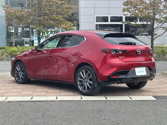 マツダ マツダ３ファストバック 15S ツーリング 福島県 2021(令3)年 2.8万km ソウルレッドクリスタルM 純正ナビゲーション(SD欠品)/【CD/DVD/USB/HDMI/TV】/360°ビューモニター/ドライブレコーダー/ビルトインETC/アクティブドライビングディスプレイ/ブラインドスポットモニタリング/車線逸脱警報システム/レーンキープアシストシステム/レーダークルーズコントロール/アイドリングストップ/LEDオートライト/純正フロアマット
