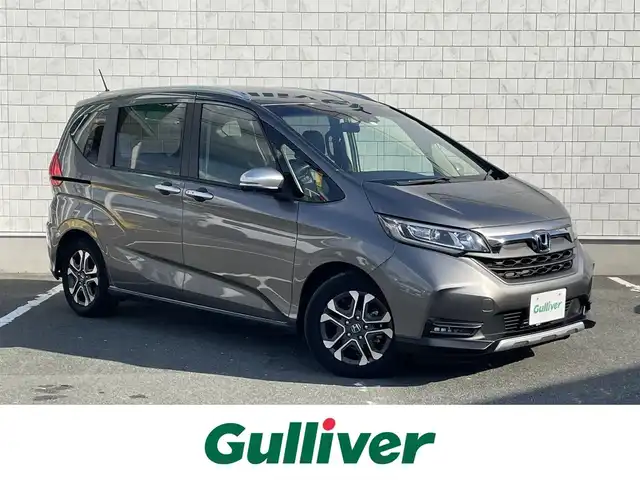 ホンダ フリード＋ クロスター 愛知県 2023(令5)年 1.7万km スーパープラチナグレーメタリック 純正SDメモリーナビ/バックカメラ/フルセグTV/CD/DVD再生/ETC(新セキュリティ対応)/ミュージックサーバー(SD録音)/Bluetooth/USB接続/レーダークルーズコントロール/合成皮革シート/シートヒーター(D/N)/両側パワースライドドア/純正フロアマット/フルフラットシート/ウォークスルー(1列目)/純正15 インチアルミホイール/LEDヘッドライト/コーナーセンサー/横滑り防止装置/衝突軽減ブレーキ/レーンキープアシスト/スマートキー/プッシュスタート