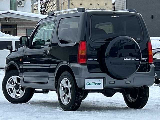 スズキ ジムニー ランドベンチャー 道北・旭川 2008(平20)年 9.2万km ブルーイッシュブラックパール3 /4WD//CDオーディオ//運転席シートヒーター//バックカメラ//ミラーヒーター//革巻きステアリング//ETC//フォグランプ//夏タイヤ積込//スペアキー//純正フロアマット//ドアバイザー//電動格納ミラー//保証書