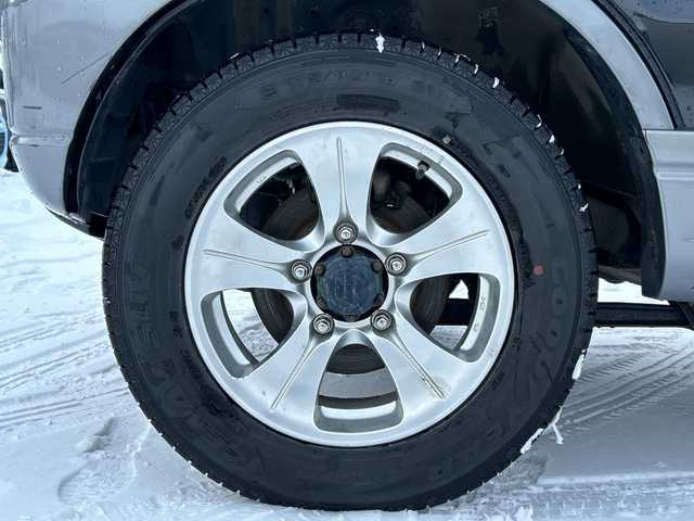 スズキ ジムニー ランドベンチャー 道北・旭川 2008(平20)年 9.2万km ブルーイッシュブラックパール3 /4WD//CDオーディオ//運転席シートヒーター//バックカメラ//ミラーヒーター//革巻きステアリング//ETC//フォグランプ//夏タイヤ積込//スペアキー//純正フロアマット//ドアバイザー//電動格納ミラー//保証書