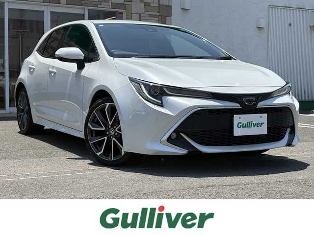 トヨタ カローラ スポーツ G Z 徳島県 2021(令3)年 2.6万km プラチナホワイトパールマイカ 純正ナビ（AM/FM/TV/DVD/CD/BT)/プッシュスタート/バックカメラ/クルーズコントロール（追従有）/ビルトインETC/フルセグTV（走行中視聴不可）/ヘッドアップディスプレイ/ドライブレコーダー（前後）/純正フロアマット/シートヒーター（前席）/コーナーセンサー/パドルシフト/オートホールド/横滑り防止装置/レーンキープアシスト/盗難防止装置/オートライト/オートハイビーム/LEDヘッドライト