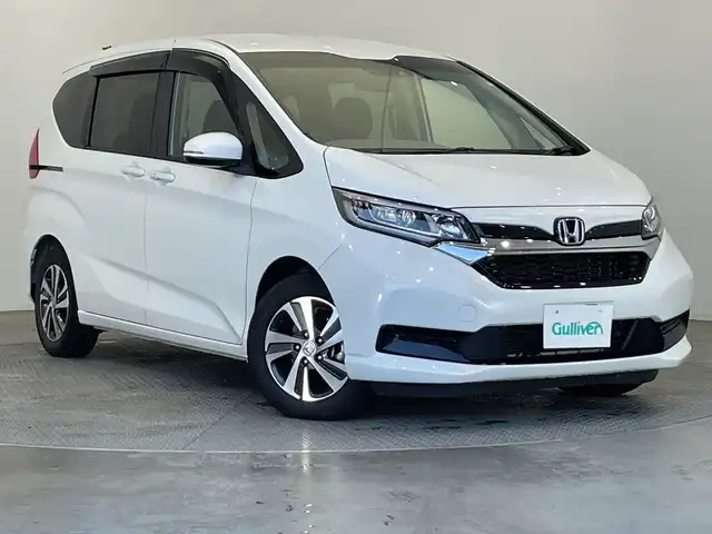 ホンダ フリード G ホンダセンシング 栃木県 2020(令2)年 1.9万km プラチナホワイトパール 純正オーディオ/(AM/FM/AUX/CD)/ホンダセンシング/・衝突軽減ブレーキ/・レーンアシスト/・アダプティブクルーズ/・先行車発進お知らせ/・標識認識機能/ETC/バックソナー/両側パワースライドドア/アイドリングストップ/オートライト/オートエアコン/電動格納ミラー/純正アルミホイール/純正フロアマット/スマートキー×２