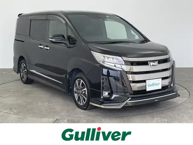 トヨタ ノア Si ダブルバイビーⅡ 大分県 2020(令2)年 4.7万km ブラック モデリスタエアロ　/純正１０型ナビ　/　（ＡＭ／ＦＭ／ＣＤ／ＤＶＤ／ＢＴ）　/フルセグＴＶ　/バックモニター　/純正フリップダウンモニター　/トヨタセーフティーセンス　/両側パワスラ　/ハーフレザーシート/クルコン　/純正フロアマット/純正16インチAW/LEDヘッドライト/オートライト/ＥＴＣ