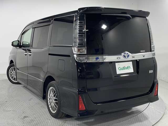 トヨタ ヴォクシー ハイブリッド ZS 煌Ⅱ 広島県 2020(令2)年 6.2万km ブラック 純正10.5型ナビ/純正フリップダウンモニター/両側パワースライドドア/バックカメラ/クリアランスソナー/セーフティセンス/・プリクラッシュセーフティ/・レーンディパーチャーアラート/・オートマチックハイビーム/LEDヘッドランプ/純正16インチAW/ETC