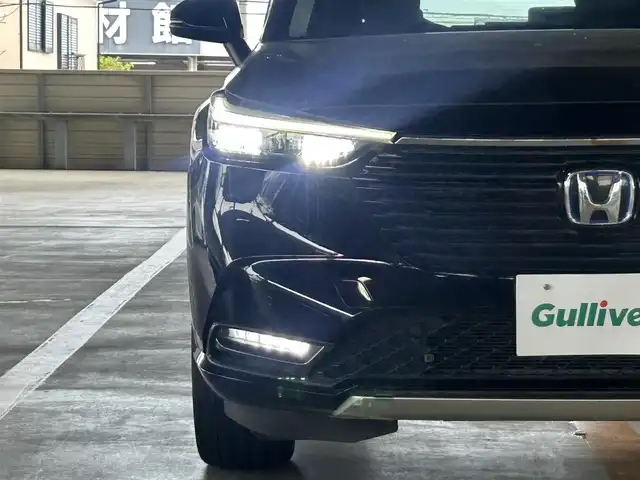 ホンダ ヴェゼル ハイブリッド e:HEV Z 静岡県 2022(令4)年 2.8万km クリスタルブラックパール ホンダセンシング/ケンウッド９型ナビ/フルセグTV/ＤＶＤ/ＥＴＣ/ＬＫＡ/ＡＣＣ/バックカメラ/ハーフレザー/ハンドル＆シートヒーター/ブラインドスポットインフォメーション/パドルシフト/純正１８ＡＷ/ハンズフリーアクセスパワーテールゲート（予約クローズ機能付）LEDシーケンシャルターンシグナルランプ（フロント）/クリアブラック塗装バンパーガーニッシュ（フロント/サイド/リア）/親水/ヒーテッドドアミラー/熱線入りフロントウインドウ/本革巻セレクトレバー/車速連動間欠/バリアブル間欠フロントワイパー（ミスト機構付）〈雨滴検知式〉/LEDフォグライト/ヒルディセントコントロール