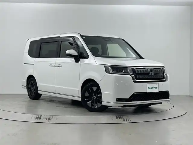 ホンダ ステップワゴン スパーダ eHEV 埼玉県 2024(令6)年 1.4万km プラチナホワイトパール Honda CONNECT for Gathers＋ナビ装着用スペシャルパッケージ/ブラインドスポットインフォメーション/Honda SENSING/パワーテールゲート(メモリー機能付)/ 	2列目オットマン/運転席＆助手席シートヒーター/トリプルゾーンコントロール・フルオートエアコンディショナー/コンビシート/16インチアルミホイール(SPADA専用)/減速セレクター/全列USBチャージャー/パドルシフト
