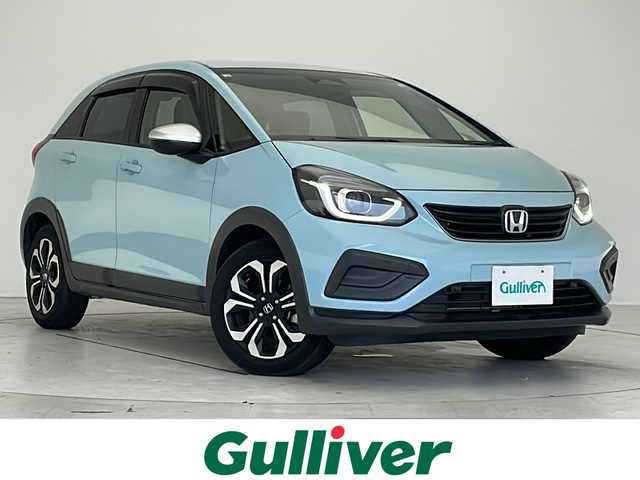 ホンダ フィット e:HEVクロスター 愛知県 2020(令2)年 2万km サーフブルー 衝突軽減システム/純正9型ナビ　ＳＤカードなし/レーダークルーズコントロール/フルセグ/CD DVD/Bluetooth/バックカメラ/コーナーセンサー/純正アルミホイール/LEDヘッドライト/オートマチックハイビーム/ETC/ステアリングスイッチ/スマートキー/プッシュスタート