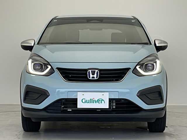 ホンダ フィット e:HEVクロスター 愛知県 2020(令2)年 2万km サーフブルー 衝突軽減システム/純正9型ナビ　ＳＤカードなし/レーダークルーズコントロール/フルセグ/CD DVD/Bluetooth/バックカメラ/コーナーセンサー/純正アルミホイール/LEDヘッドライト/オートマチックハイビーム/ETC/ステアリングスイッチ/スマートキー/プッシュスタート
