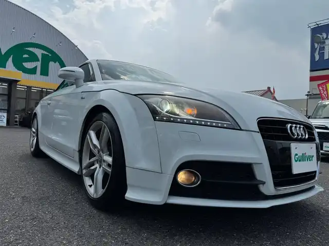 アウディ ＴＴクーペ 1．8 TFSI Sライン 滋賀県 2014(平26)年 3万km 白 純正メーカーナビ/　フルセグ Bluetooth CD DVD  ミュージックサーバー/ハーフレザーシート（黒）/ビルトインETC/純正HIDヘッドライト/フォグランプ/オートライト/純正18アルミ/純正フロアマット/スペアキー/電動格納ミラー/
