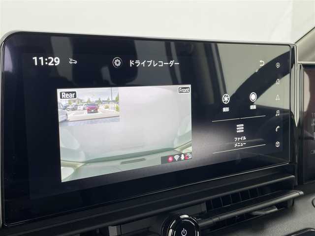 日産 セレナ e－パワー XV 富山県 2024(令6)年 0.5万km プリズムホワイト 純正12.3型ナビ（AM/FM/BT/USB/HDM）/フルセグTV/全方位カメラ/ドライブレコーダー/デジタルインナーミラー/ETC/ブラインドスポットモニター/両側パワースライドドア/シートヒーター/ハンドルヒーター/衝突被害軽減システム/レーダークルーズコントロール/レーンキープアシスト/コーナーセンサー/横滑り防止装置/アイドリングストップ/純正フロアマット/オートホールド付電子パーキング/革巻きステアリング/ステアリングスイッチ/スマートキー/スペアキー