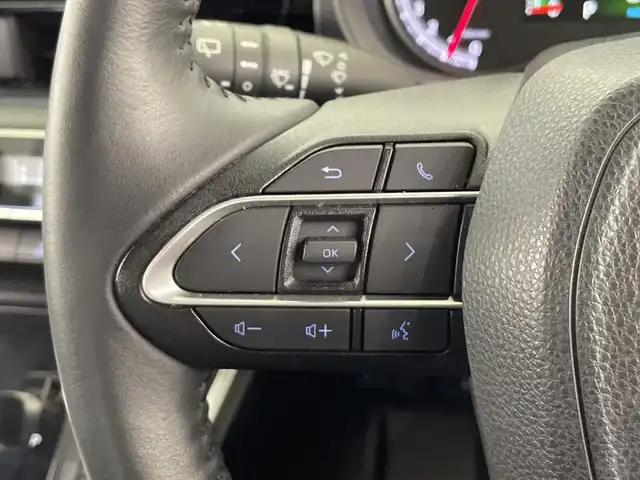 トヨタ ヴォクシー S－Z 栃木県 2023(令5)年 1.8万km ホワイトパールクリスタルシャイン 純正ナビ/（Bluetooth/CD/DVD/USB/フルセグTV/HDMI）/バックカメラ/トヨタセーフティセンス/・プリクラッシュセーフティ/・レーントレーシングアシスト/・レーンディパーチャーアラート/・ロードサインアシスト/・レーダークルーズコントロール/・オートマチックハイビーム/・先行車発進アラーム/快適利便パッケージ/・ハンズフリーデュアルパワースライドドア/・パワーバックドア/・快適温熱シート/・ステアリングヒーター/・ナノイーX/・オットマン/・角度調整付アームレスト/フリップダウンモニター/ユニバーサルステップ/ドアバイザー/前後コーナーセンサー/ビルトインETC2.0/両側パワースライドドア/オートライト/LEDヘッドライト/スマートキー/プッシュスタート/アイドリングストップ/ステアリングスイッチ/電動格納ミラー/純正アルミホイール/純正フロアマット