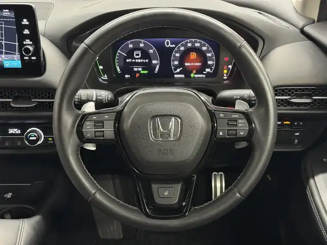 ホンダ ＺＲ－Ｖ ハイブリッド e:HEV Z 三重県 2023(令5)年 3.6万km クリスタルブラックパール ハイブリッド/FF/MTモード付フロアCVT/BOSEプレミアムサウンドシステム（12スピーカー）/Honda Connect対応 9インチナビ/（AM/FM/USB/CarPlay/AndroidAuto/Bluetooth/TV）/マルチビューカメラシステム（360カメラ）/ビルトイン ETC2.0/Honda SENSING/・衝突軽減ブレーキ［CMBS］/・車線維持支援システム［LKAS］/・路外逸脱抑制機能/・渋滞追従機能付アダプティブクルーズコントロール［ACC］/・アダプティブドライビングビーム［ADB］/・パーキングセンサーシステム/・先行車発進お知らせ機能/・誤発進抑制機能、後方誤発進抑制機能/・トラフィックジャムアシスト（渋滞運転支援機能）/・標識認識機能/・横滑り防止機能/装備/・本革シート/・ハンズフリーアクセスパワーテールゲート（予約クローズ機能付）/・パワーシート（Dメモリー付8way/N4way）/・シートヒーター（D/N）/・ステアリングヒーター/・左右独立オートエアコン/・ワイヤレス充電器/・パドルシフト/・純正18inAW/・保/取/・スマートキーx1