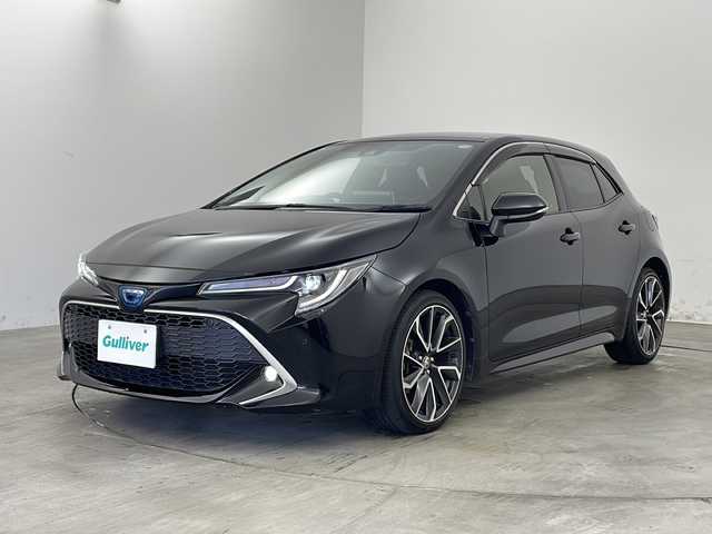 トヨタ カローラ スポーツ ハイブリッドG Z 兵庫県 2020(令2)年 6.7万km アティチュードブラックマイカ ・純正ディスプレイオーディオ＆BT＆USB＆Miracast/・バックカメラ/・ビルトインETC/・ワイヤレス充電/・スマートキー/・プッシュスタート/・前席シートヒーター/・ドアミラーヒーター/・トヨタセーフティーセンス/・プリクラッシュセーフティー/・レーンディバチャーアラート/・ブラインドスポットモニター/・クリアランスソナー/・ロードサインアシスト/・パーキングサポートブレーキ/・リヤクロストラフィックアラート/・先行車発進告知機能/・オートマチックハイビーム/・レーダークルーズコントロール/・純正18インチアルミホイール/・LEDライト/・LEDフォグ/・オートライト/・フロアマット/・W＋サイドエアバック/・カーテンエアバック/・横滑り防止装置/・アイドリングストップ
