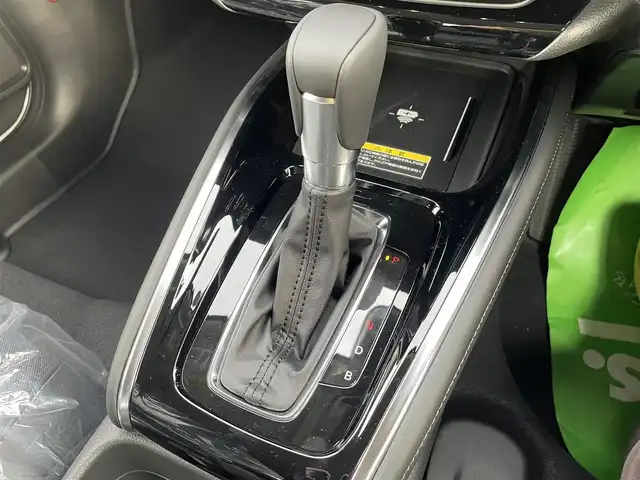 ホンダ ヴェゼル ハイブリッド e:HEV Z 石川県 2025(令7)年 0.1千km パール 登録済未使用車/4WD/純正9型ナビ/フルセグTV/バックカメラ/LEDヘッドライト/パワーバックドア/ホンダセンシング/レーダークルーズ/ETC2.0車載器/ワイヤレス充電器/フロントグリル(ベルリナブラック)/ハーフレザーシート/シートヒーター/スマートキー/プッシュスタート/保証書