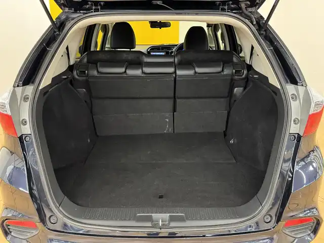 ホンダ シャトル ハイブリッド Z スタイルエディション 群馬県 2016(平28)年 8.4万km ミッドナイトブルービームM シティブレーキアクティブシステム/クルーズコントロール/純正SDナビ/　　フルセグ/BT/CD/DVD/    FM/AM/ipod/SD/USB/バックカメラ/リヤスポイラー/ブラックハーフレザーシート/オートLEDヘッドライト/フォグランプ/本革巻きステアリング/パドルシフト/ステアリングスイッチ/純正フロアマット/スマートキー/電動格納ウィンカーミラー/横滑り防止/ビルドインETC