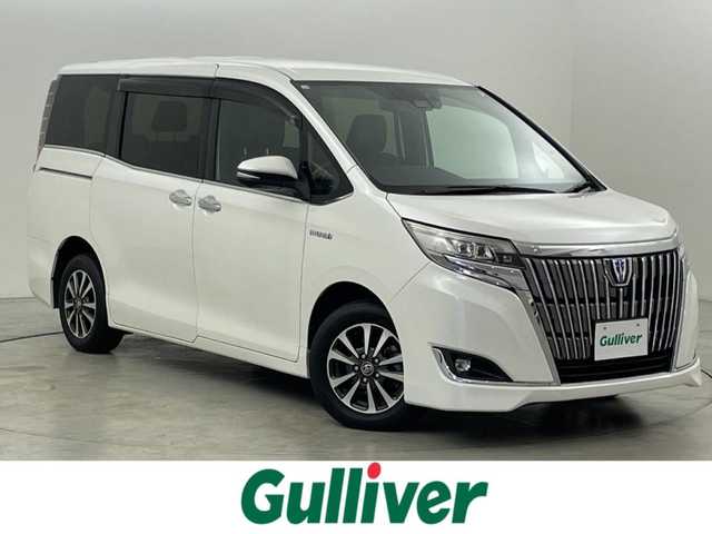 トヨタ エスクァイア ハイブリッド Gi プレミアムパッケージ 福岡県 2018(平30)年 6.5万km ホワイトパールクリスタルシャイン 純正９型ナビ（フルセグＴＶ）　/バックカメラ　/前方ドラレコ　/クルーズコントロール　/衝突被害軽減ブレーキ　/レーンキープ　/両電動スライドドア　/ハーフレザー　/シートヒーター　/ステアリングヒーター　/ＬＥＤライト