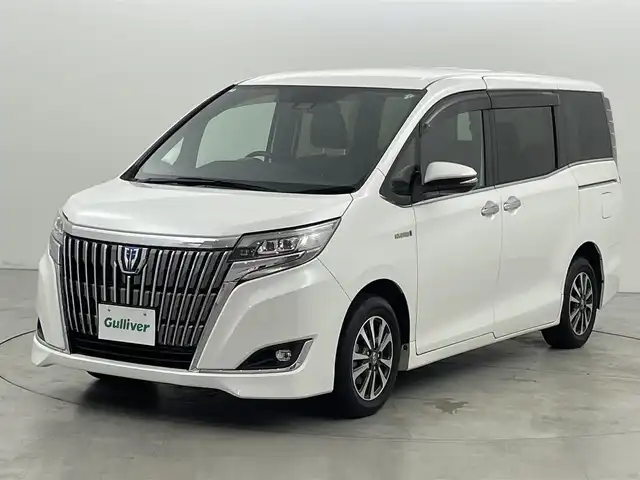 トヨタ エスクァイア ハイブリッド Gi プレミアムパッケージ 福岡県 2018(平30)年 6.5万km ホワイトパールクリスタルシャイン 純正９型ナビ（フルセグＴＶ）　/バックカメラ　/前方ドラレコ　/クルーズコントロール　/衝突被害軽減ブレーキ　/レーンキープ　/両電動スライドドア　/ハーフレザー　/シートヒーター　/ステアリングヒーター　/ＬＥＤライト