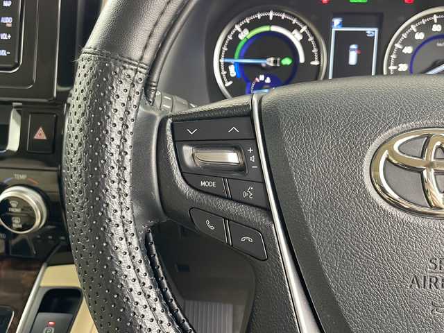 トヨタ ヴェルファイア ハイブリット X 道央・札幌 2019(平31)年 5.5万km ホワイトパールクリスタルシャイン ○4WD/○ツインムーンルーフ/○純正ナビ(BT/CD/DVD)/○フルセグTV/○パワースライドドア(両側)/○バックカメラ/○ビルトインETC2.0/○コムテックドライブレコーダー/○レーダークルーズコントロール/○クリアランスソナー/○セーフティセンス/・プリクラッシュセーフティ/・ロードサインアシスト/・レーントレーシングアシスト/・オートマチックハイビーム/○2眼LEDヘッドランプ/○デュアルオートエアコン/○本革巻きステアリング/○ステアリングカバー付/○ベージュファブリックシート/○2列目チップアップシート/○純正16インチアルミホイール/○スマートエントリー/プッシュスタートシステム